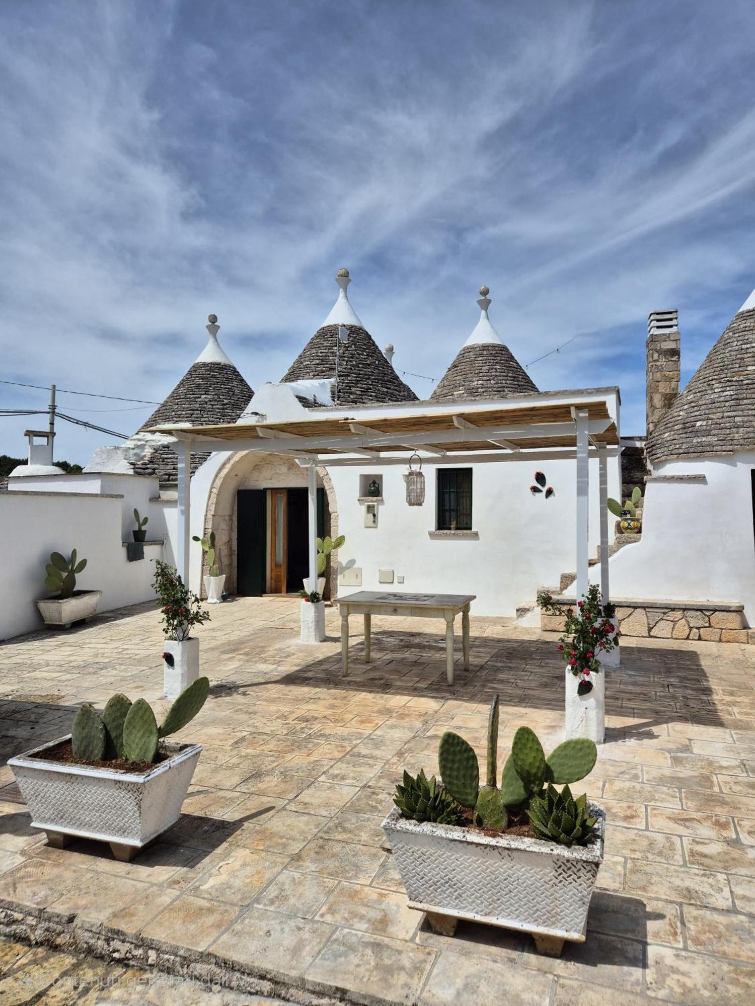 Trulli And Pool - I Cactus Villa Martina Franca Bagian luar foto